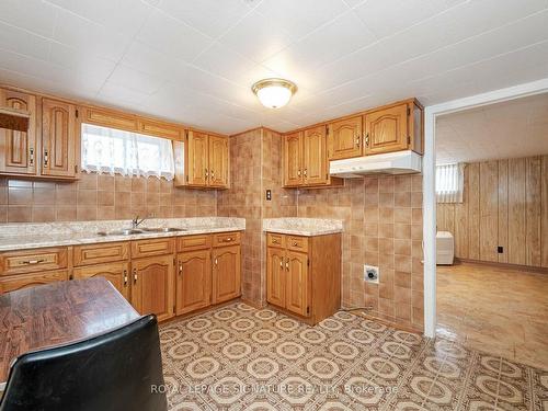 76 Cannon Rd, Toronto, ON - Indoor Photo Showing Kitchen With Double Sink