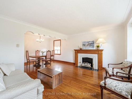 76 Cannon Rd, Toronto, ON - Indoor Photo Showing Living Room With Fireplace