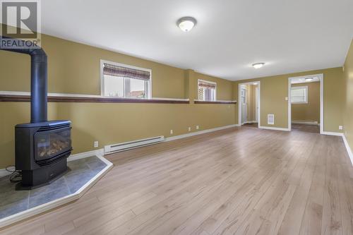 18 Coates Road, Conception Bay South, NL - Indoor With Fireplace