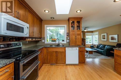 7155 St Bernadette Place, Prince George, BC - Indoor Photo Showing Kitchen With Double Sink