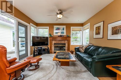 7155 St Bernadette Place, Prince George, BC - Indoor Photo Showing Living Room With Fireplace