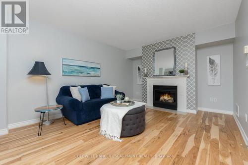 31 Dawkins Crescent, Halton Hills, ON - Indoor Photo Showing Living Room With Fireplace