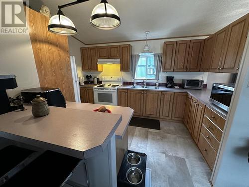 5480 Tatton Station Road, 100 Mile House, BC - Indoor Photo Showing Kitchen With Double Sink