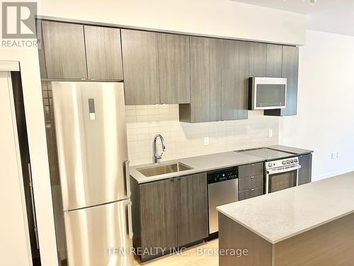 316 - 2433 Dufferin Street, Toronto (Briar Hill-Belgravia), ON - Indoor Photo Showing Kitchen With Stainless Steel Kitchen