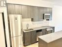 316 - 2433 Dufferin Street, Toronto (Briar Hill-Belgravia), ON  - Indoor Photo Showing Kitchen With Stainless Steel Kitchen 