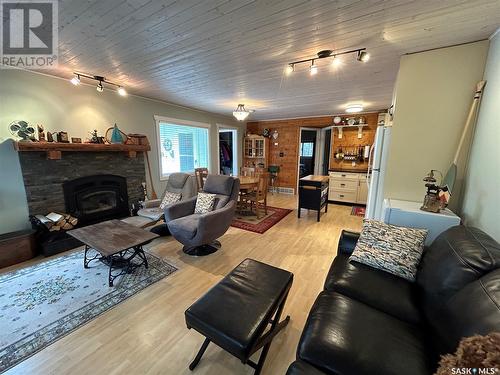 37 Saskatchewan Drive, Candle Lake, SK - Indoor Photo Showing Living Room With Fireplace