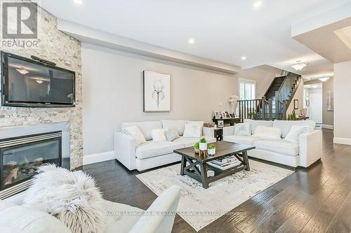 2388 Stone Glen Crescent, Oakville, ON - Indoor Photo Showing Living Room With Fireplace