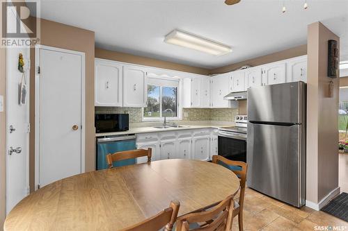 801 V Avenue N, Saskatoon, SK - Indoor Photo Showing Kitchen With Double Sink
