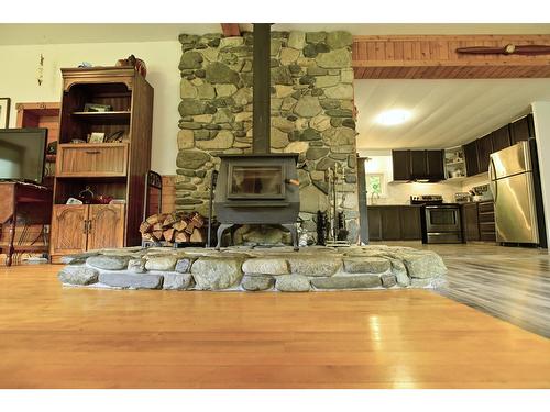8114 Highway 6, Salmo, BC - Indoor With Fireplace