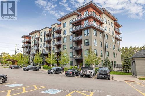 109 - 300 Essa Road, Barrie, ON - Outdoor With Balcony With Facade