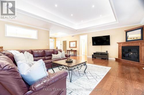 138 Knox Road E, Wasaga Beach, ON - Indoor Photo Showing Living Room With Fireplace