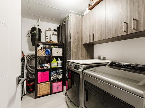 Salle de lavage - 7-303 Rue De L'Aigle, Carignan, QC - Indoor Photo Showing Laundry Room