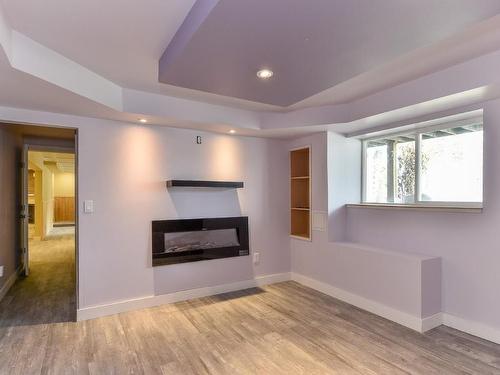 7246 Dunwaters Drive, Kelowna, BC - Indoor With Fireplace