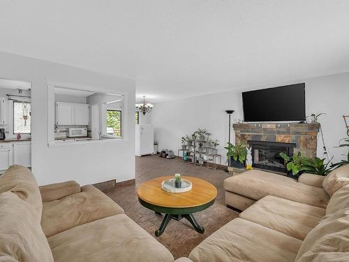 3331 Gates Court, West Kelowna, BC - Indoor Photo Showing Living Room With Fireplace