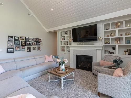 686 Wain Rd, North Saanich, BC - Indoor Photo Showing Living Room With Fireplace