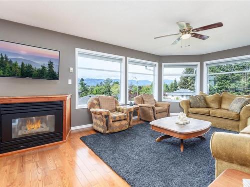 1485 10Th St East, Courtenay, BC - Indoor Photo Showing Living Room With Fireplace