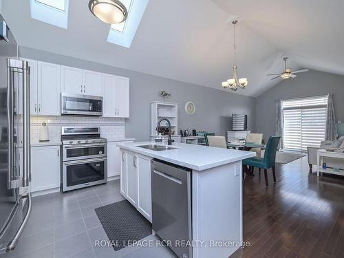 63 Summerhill Dr, New Tecumseth, ON - Indoor Photo Showing Kitchen With Stainless Steel Kitchen With Double Sink