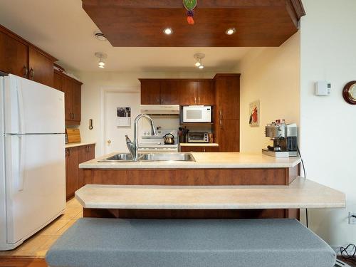 Kitchen - B-7 Rue Ste-Angélique, Vaudreuil-Dorion, QC - Indoor Photo Showing Kitchen With Double Sink