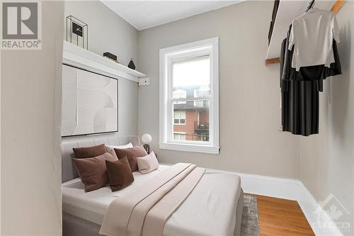 This photo has been virtually staged. - 154-156 Beckwith Street N, Smiths Falls, ON - Indoor Photo Showing Bedroom