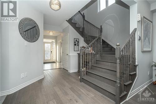 Hardwood floors and stairs - 927 Nokomis Place, Ottawa, ON - Indoor Photo Showing Other Room