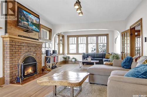 7 Angus Crescent, Regina, SK - Indoor Photo Showing Living Room With Fireplace