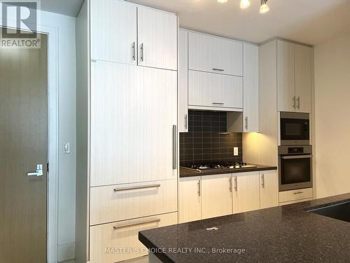1016 - 29 Queens Quay E, Toronto, ON - Indoor Photo Showing Kitchen With Double Sink