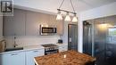 422 - 2301 Danforth Avenue, Toronto, ON  - Indoor Photo Showing Kitchen With Stainless Steel Kitchen 