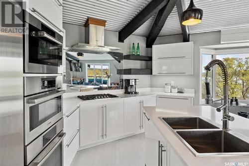 143 Summerfeldt Drive, Blackstrap Thode, SK - Indoor Photo Showing Kitchen With Double Sink