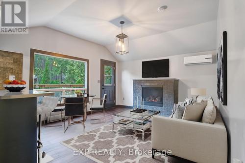 2588 Reeves Road, Tay, ON - Indoor Photo Showing Living Room With Fireplace
