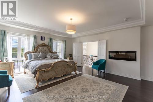 7263 Second Line W, Mississauga, ON - Indoor Photo Showing Bedroom With Fireplace