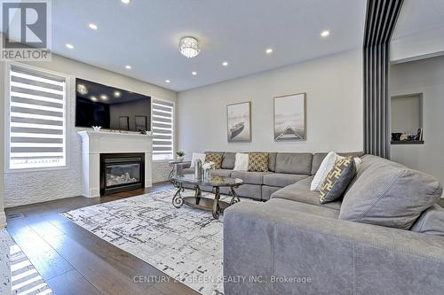 58 Curran Road, Hamilton, ON - Indoor Photo Showing Living Room With Fireplace