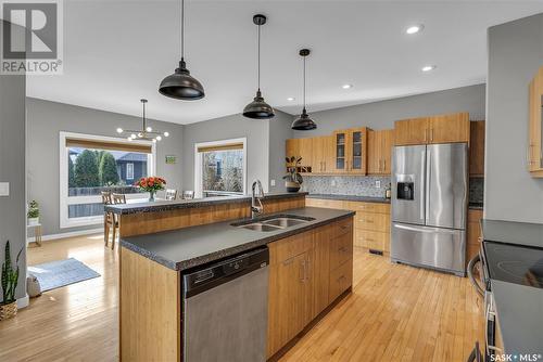 118 Blackstock Cove, Saskatoon, SK - Indoor Photo Showing Kitchen With Double Sink