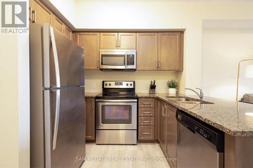 208 - 630 Sauve Street, Milton, ON - Indoor Photo Showing Kitchen With Double Sink