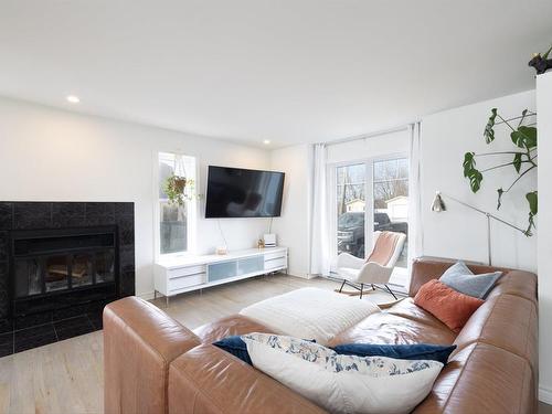 Living room - 168 Ch. Du Fleuve, Coteau-Du-Lac, QC - Indoor Photo Showing Living Room With Fireplace