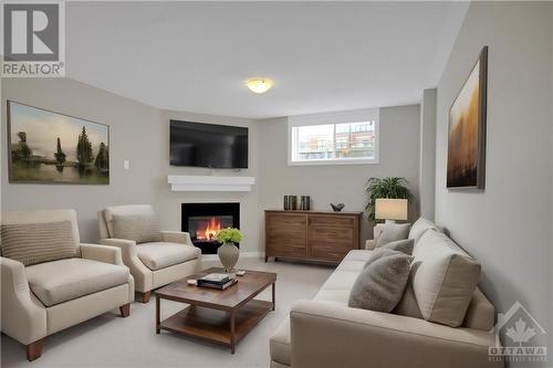 179 Mancini Way, Ottawa, ON - Indoor Photo Showing Living Room With Fireplace