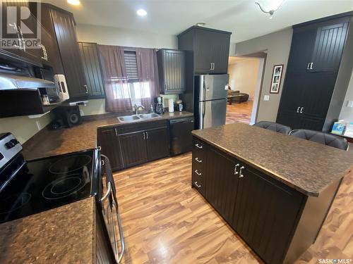 62 Haultain Avenue, Yorkton, SK - Indoor Photo Showing Kitchen With Double Sink