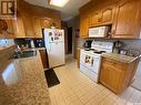 178 Franklin Drive, Yorkton, SK  - Indoor Photo Showing Kitchen With Double Sink 