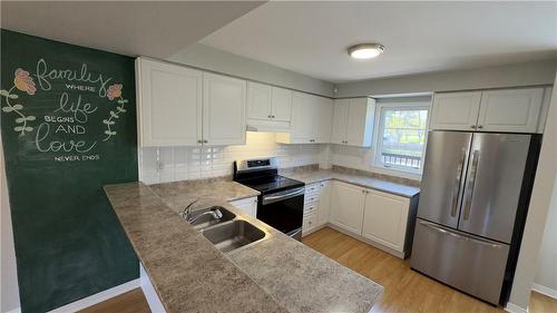 2375 Truscott Drive|Unit #7, Mississauga, ON - Indoor Photo Showing Kitchen With Stainless Steel Kitchen With Double Sink