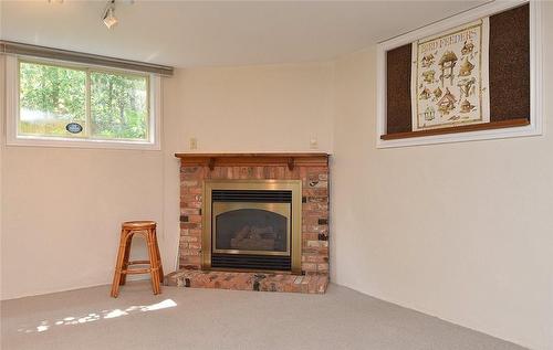 3023 St Clair Avenue, Burlington, ON - Indoor Photo Showing Living Room With Fireplace