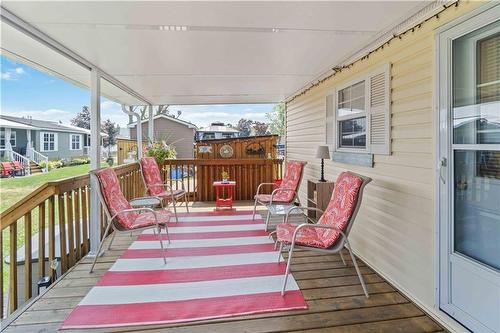 Covered deck at side - 1501 Line 8 Road|Unit #503, Queenston, ON 