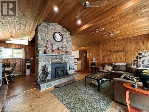Wood Fireplace - 270 Barney'S Boulevard, Northern Bruce Peninsula, ON - Indoor Photo Showing Living Room With Fireplace