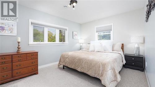 Primary Bedroom with Walk-In Closet - 68 Sauble Falls Road, Sauble Beach, ON - Indoor Photo Showing Bedroom