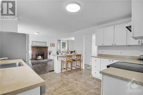 2980 Roger Stevens Drive, Ottawa, ON - Indoor Photo Showing Kitchen With Fireplace