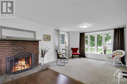 2980 Roger Stevens Drive, Ottawa, ON - Indoor Photo Showing Living Room With Fireplace