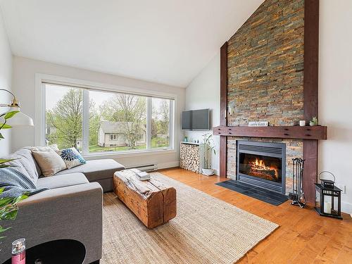 Living room - 195 Rue De Gatineau, Bromont, QC - Indoor Photo Showing Living Room With Fireplace