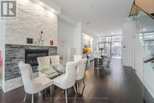 Th05 - 101 Erskine Avenue, Toronto (Mount Pleasant West), ON - Indoor Photo Showing Dining Room With Fireplace