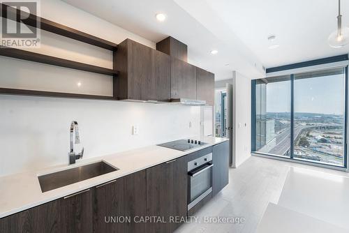 2007 - 16 Bonnycastle Street, Toronto (Waterfront Communities), ON - Indoor Photo Showing Kitchen With Upgraded Kitchen