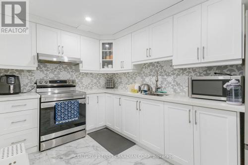 Finished Legal Basement - 2335 Marcel Circle, London, ON - Indoor Photo Showing Kitchen With Double Sink