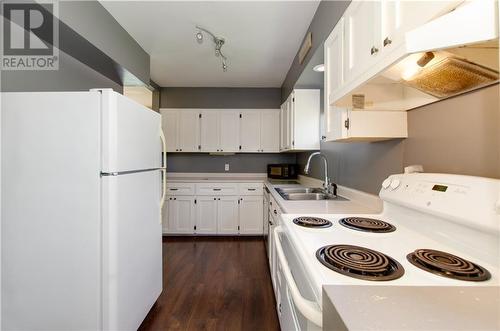 50 Academy Street, Hillsborough, NB - Indoor Photo Showing Kitchen With Double Sink