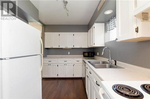 50 Academy Street, Hillsborough, NB - Indoor Photo Showing Kitchen With Double Sink